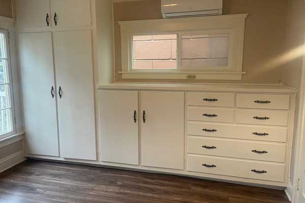 a white cabinet with a window in a Glendale kitchen
